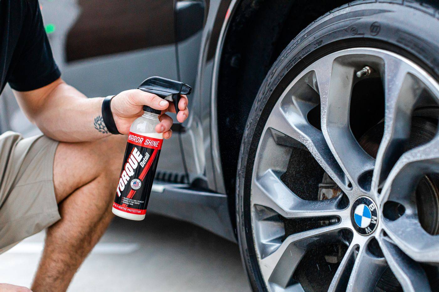 Tire shine being applied to a clean wheel